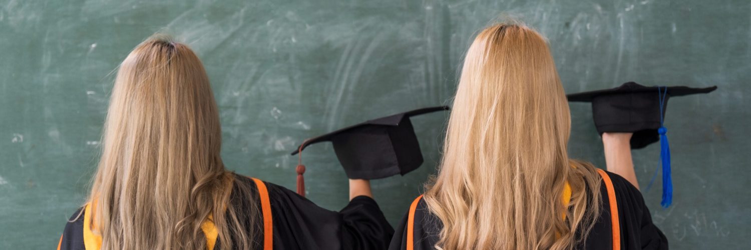 Graduation.,Rear,View,Of,The,Student,With,University,Graduation,Cap